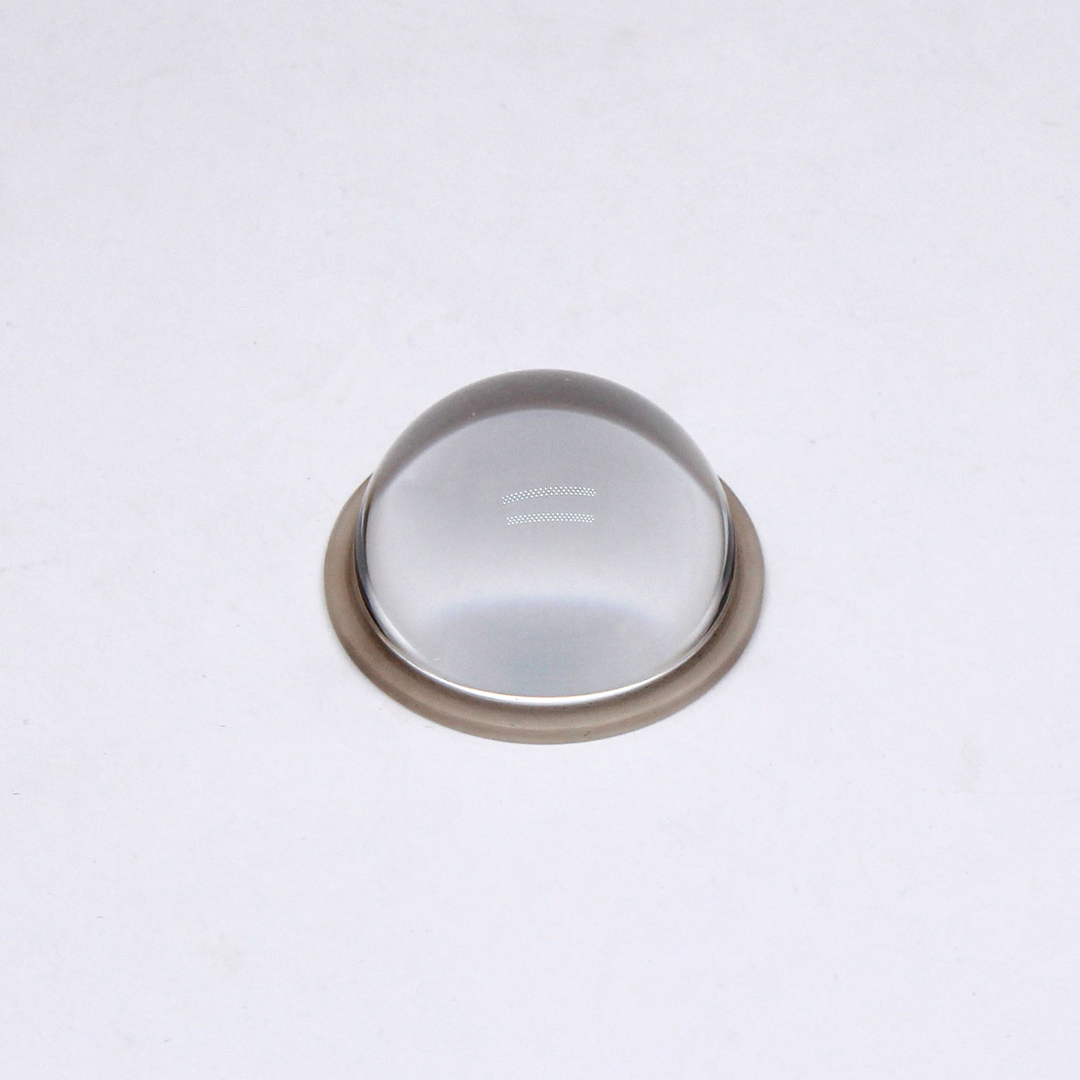 Spherical lens with flange for precision optical alignment and mounting