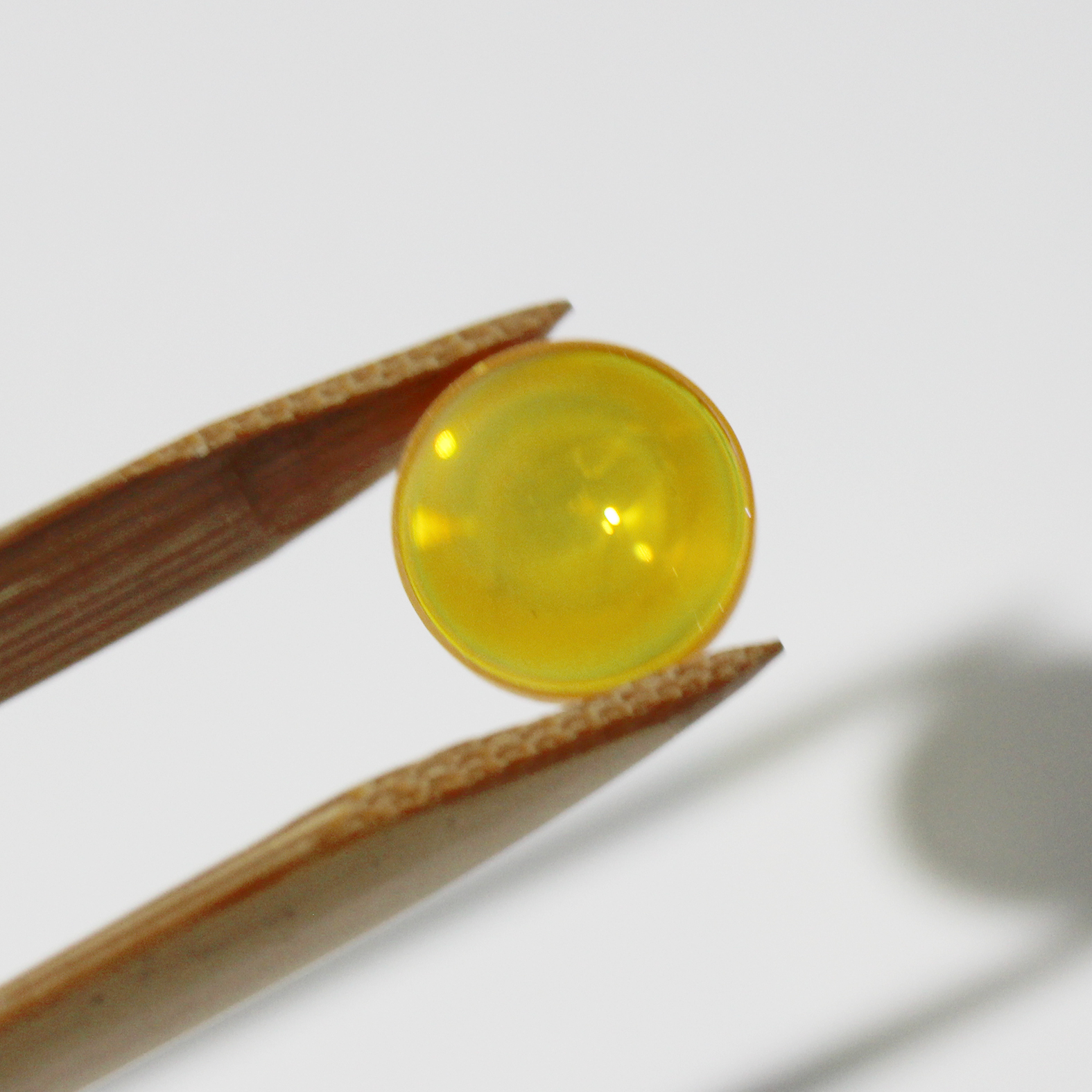 High transmission ZnSe lens for CO2 laser beam focusing