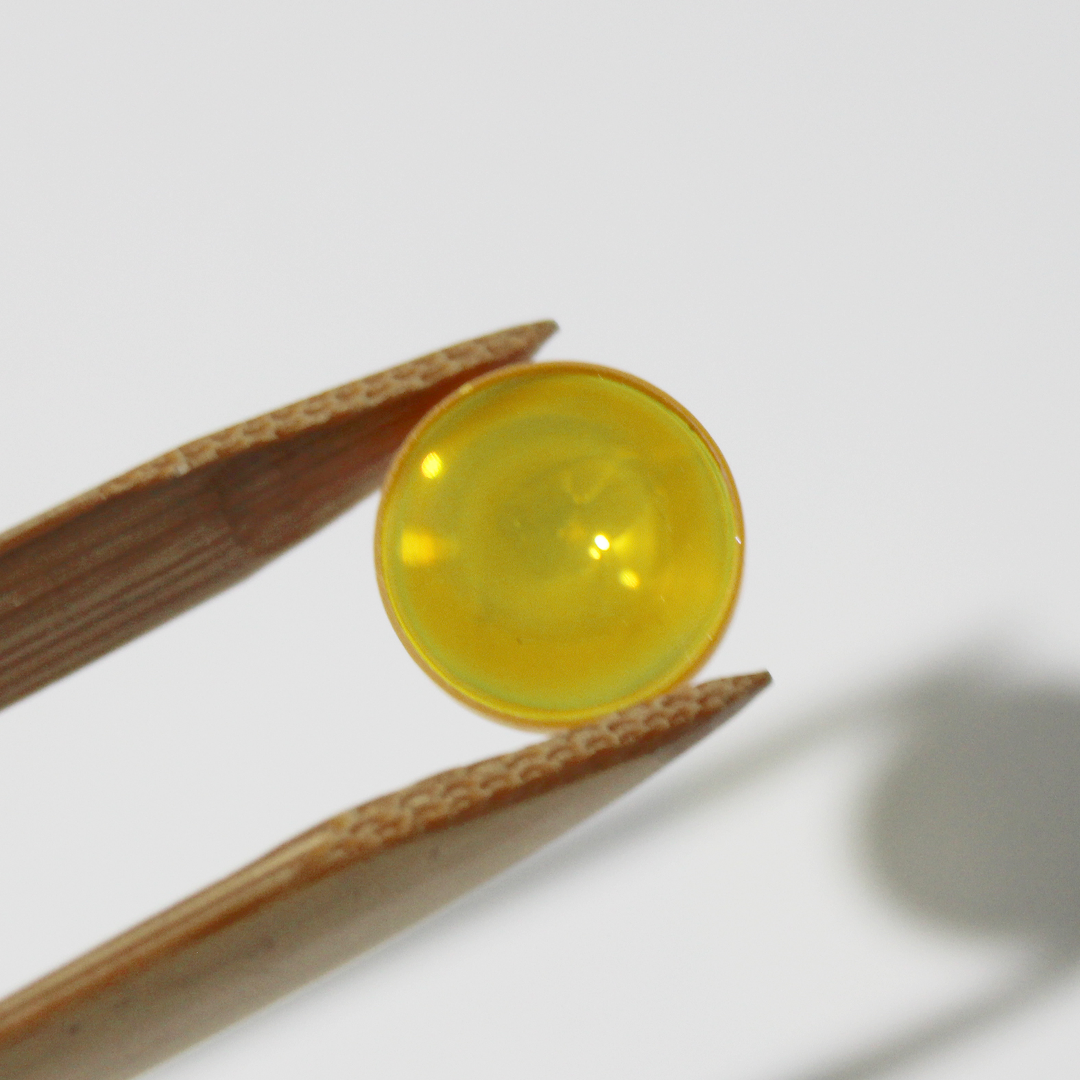High transmission ZnSe lens for CO2 laser beam focusing