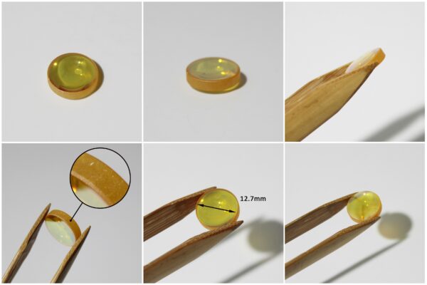 High transmission ZnSe lens for CO2 laser beam focusing
