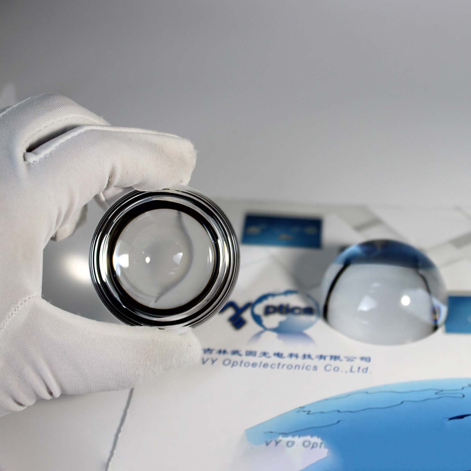 Precision half ball lens for optical imaging and photonic systems