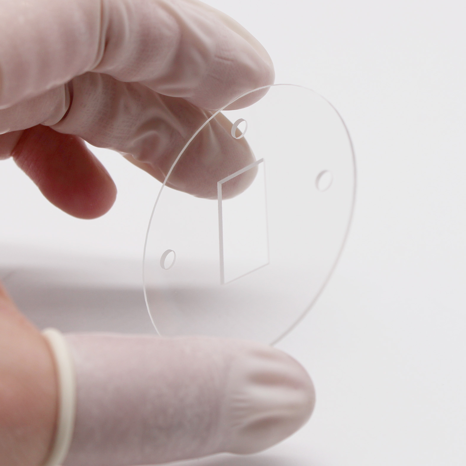 Quartz optical window with precision holes