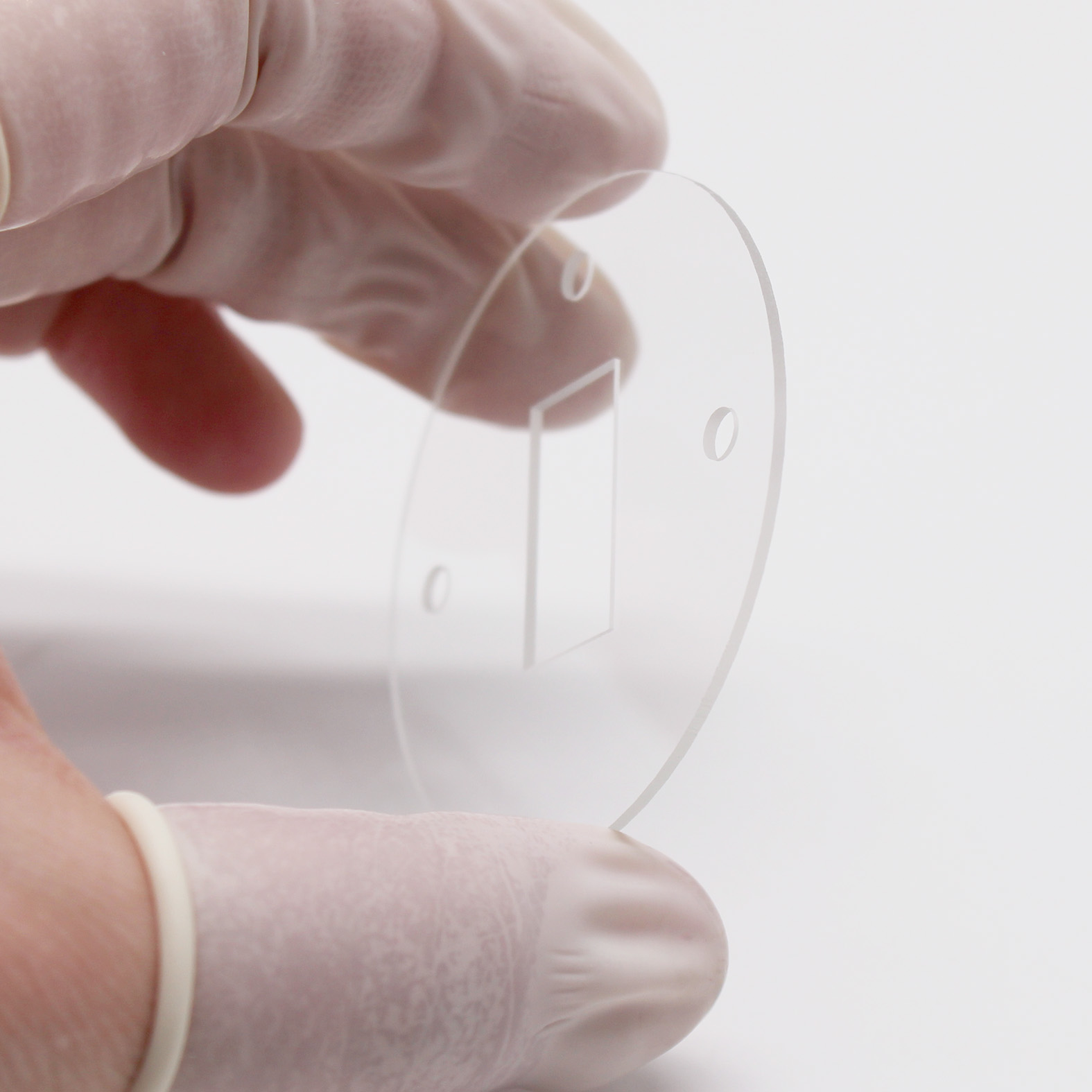 Quartz optical window with precision holes