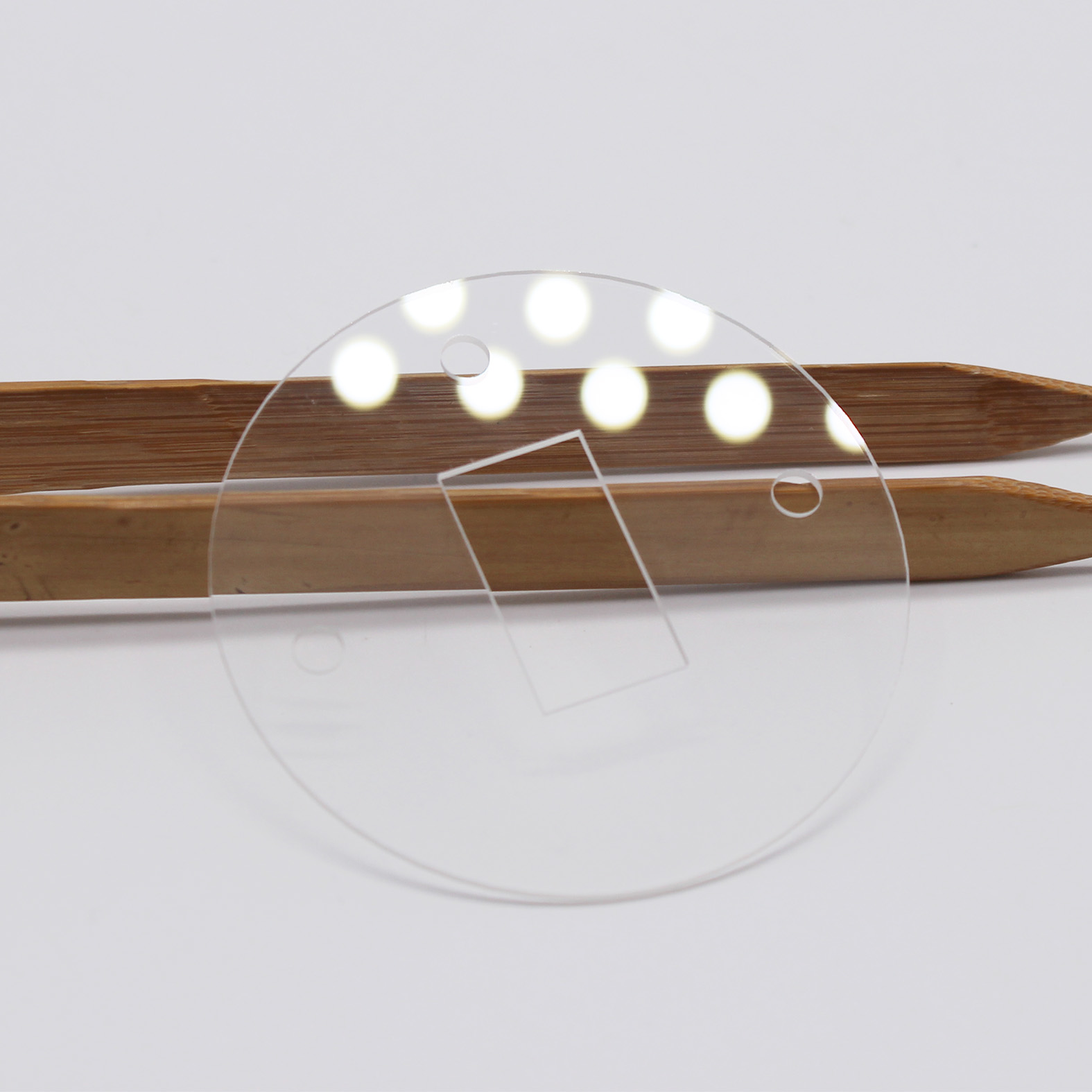 Quartz optical window with precision holes