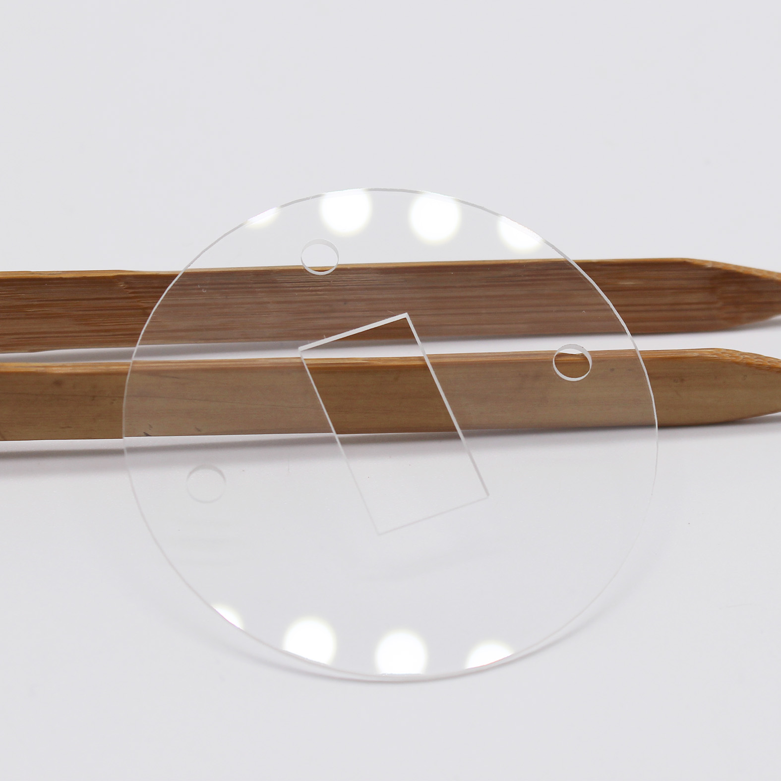 Quartz optical window with precision holes