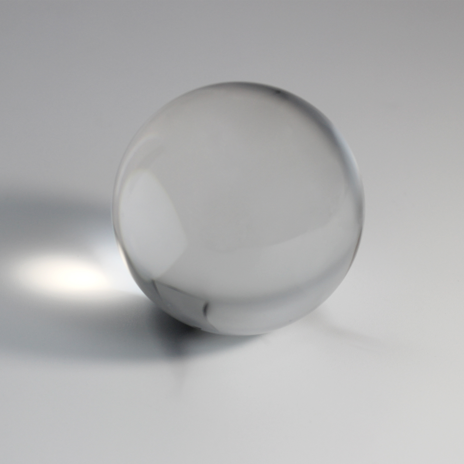 Glass ball lens for optical coupling applications
