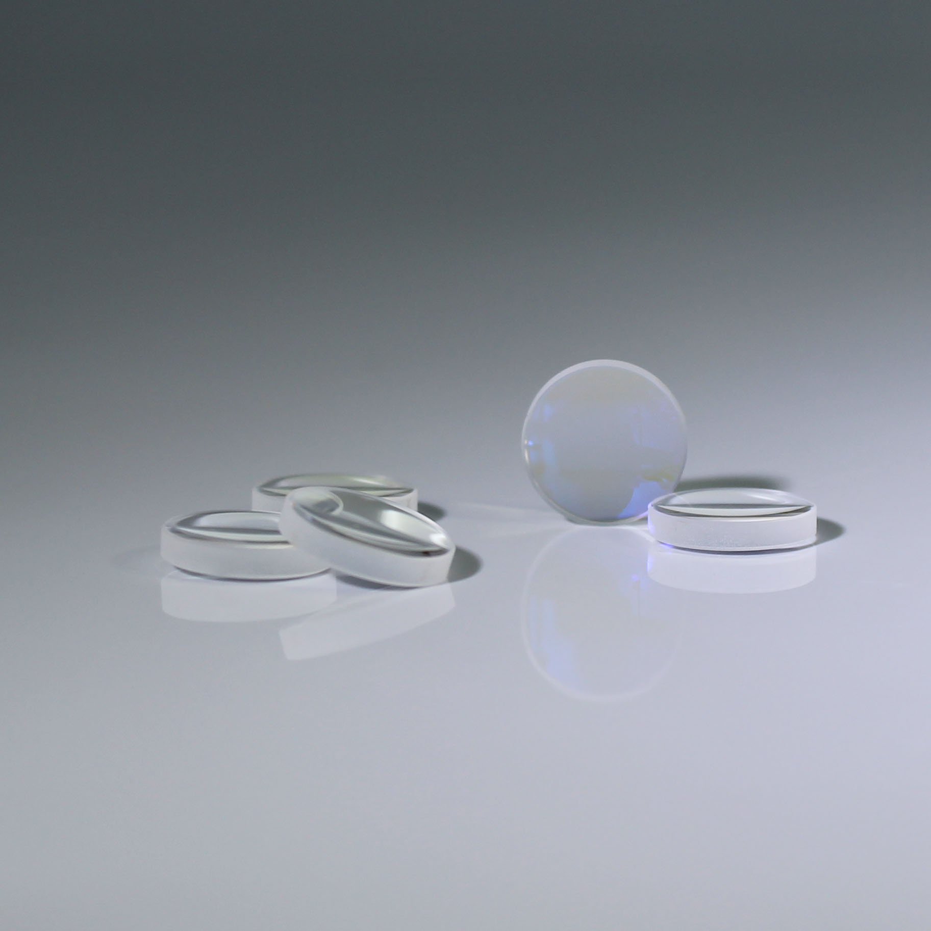 Double convex lens for precision focusing applications
