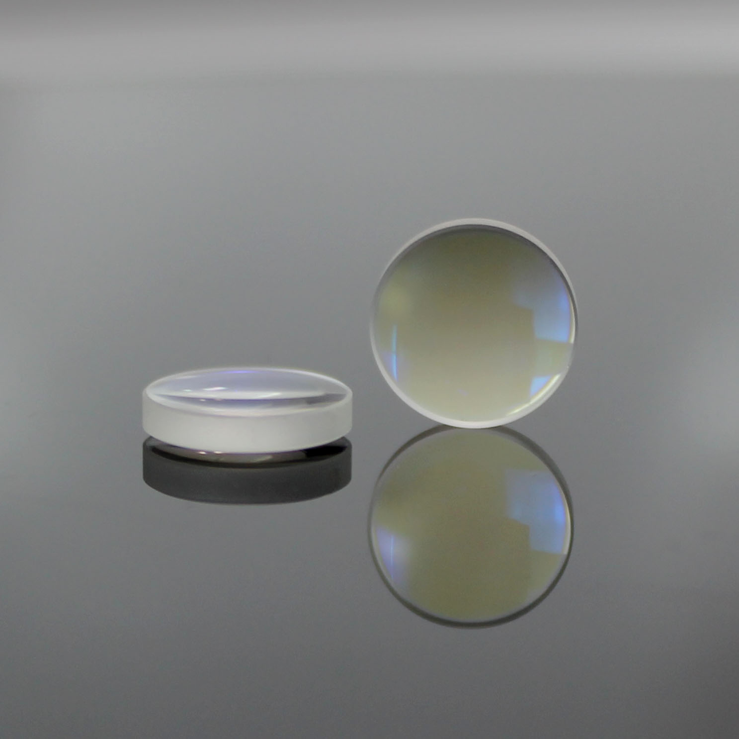 Double convex lens for precision focusing applications