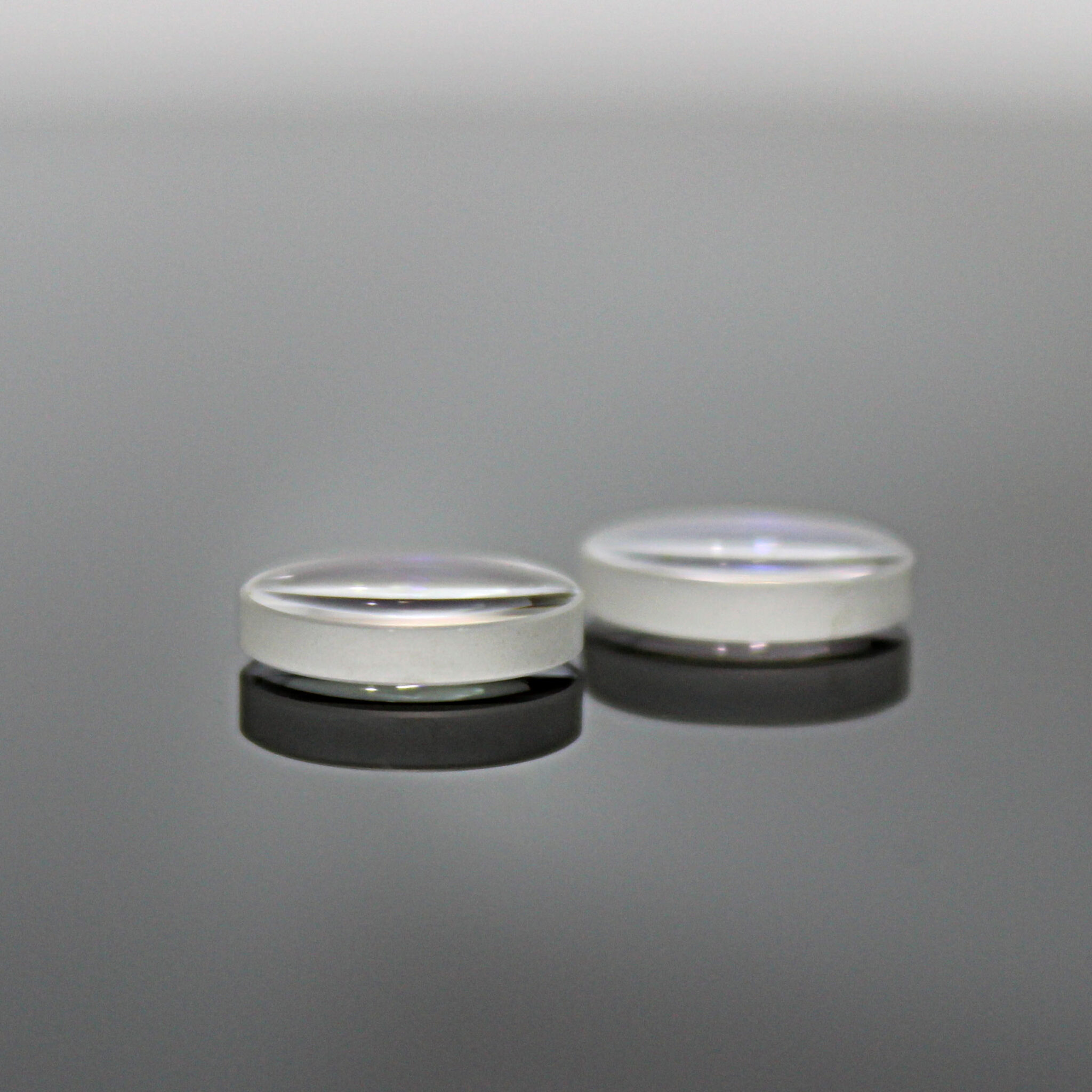 Double convex lens for precision focusing applications