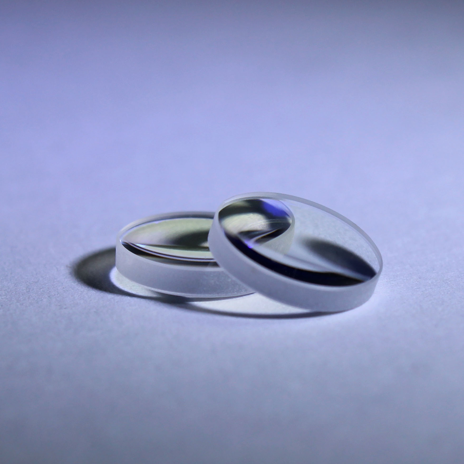 Double convex lens for precision focusing applications