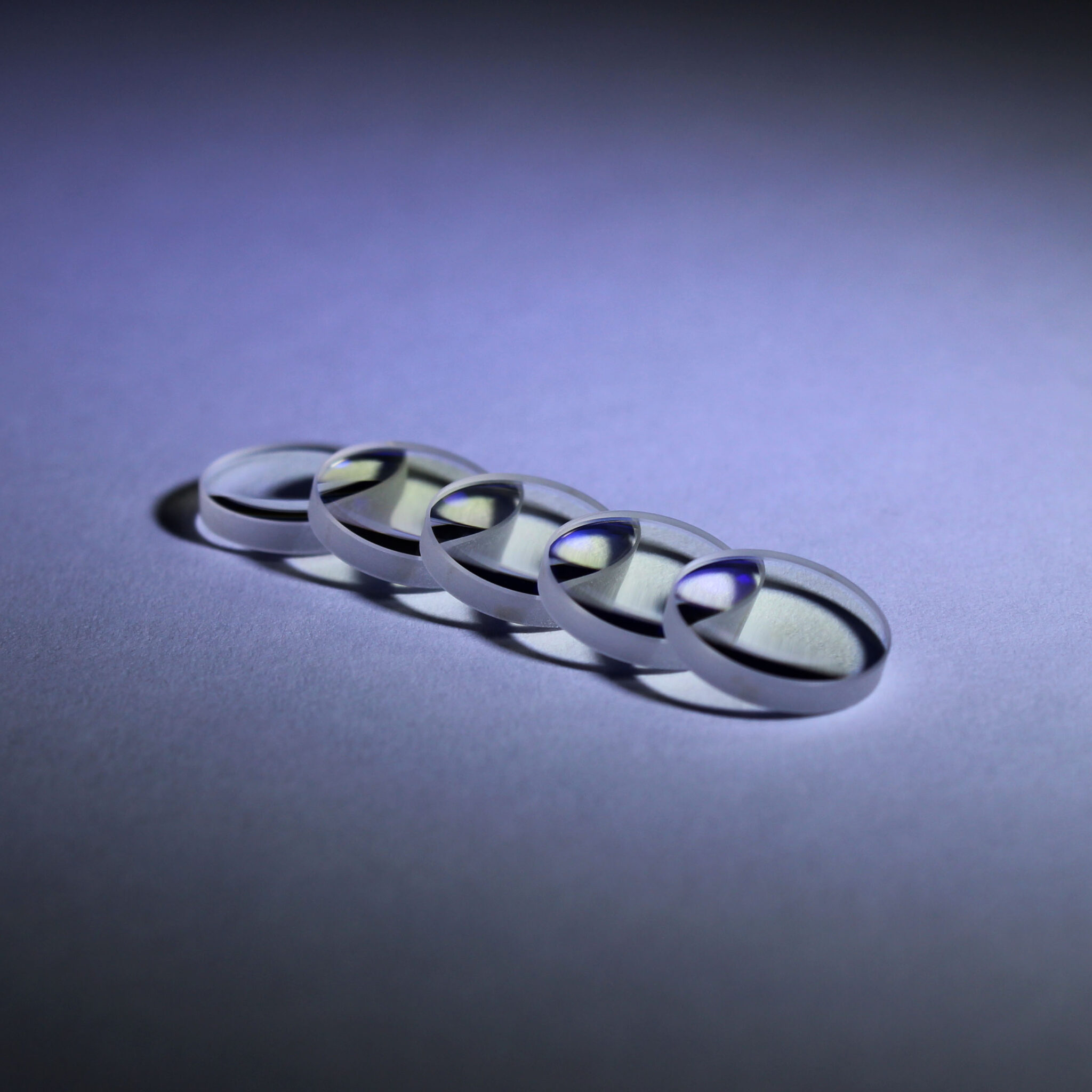 Double convex lens for precision focusing applications