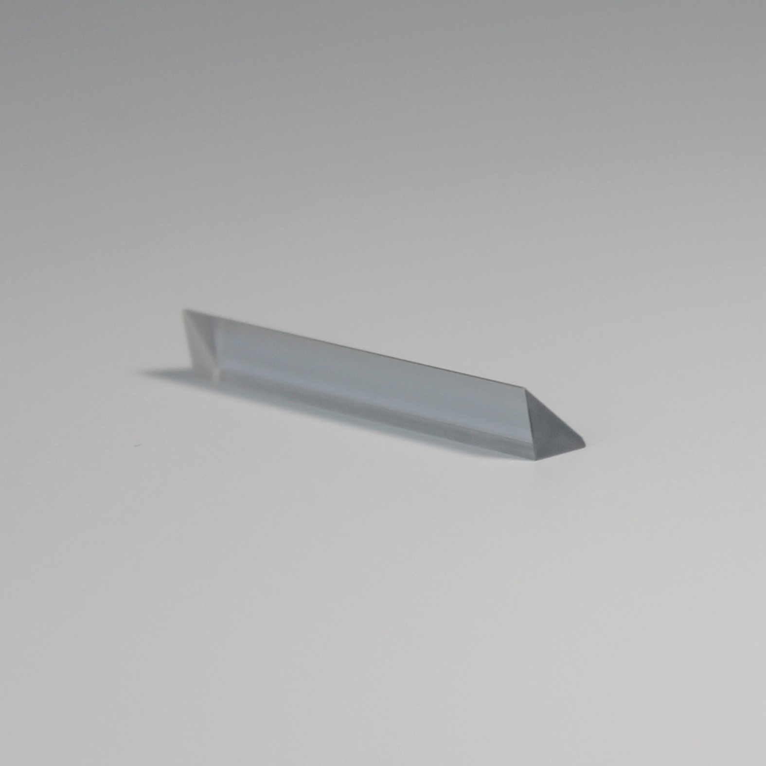 Precision triangular optical prism