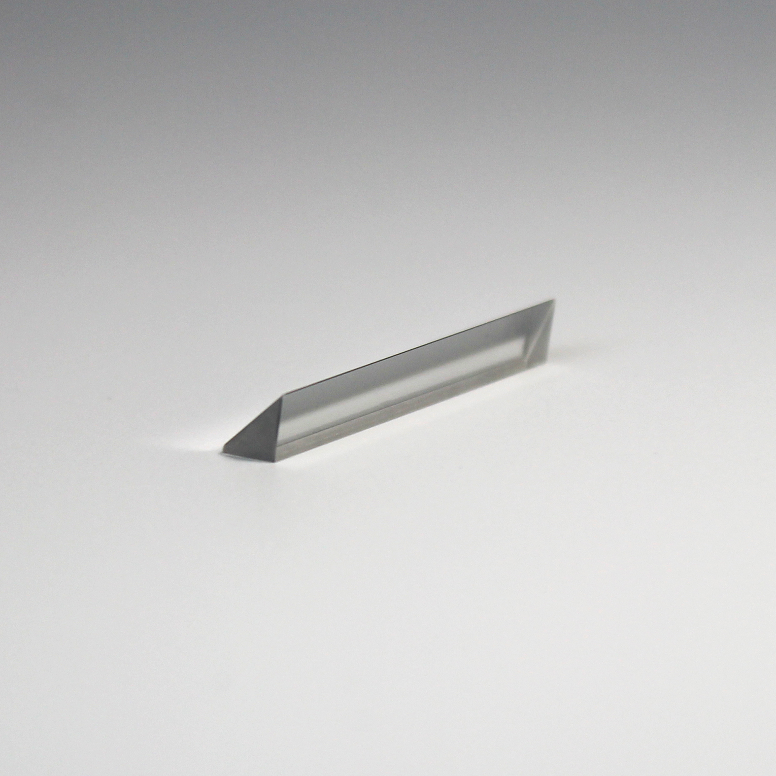 Precision triangular optical prism