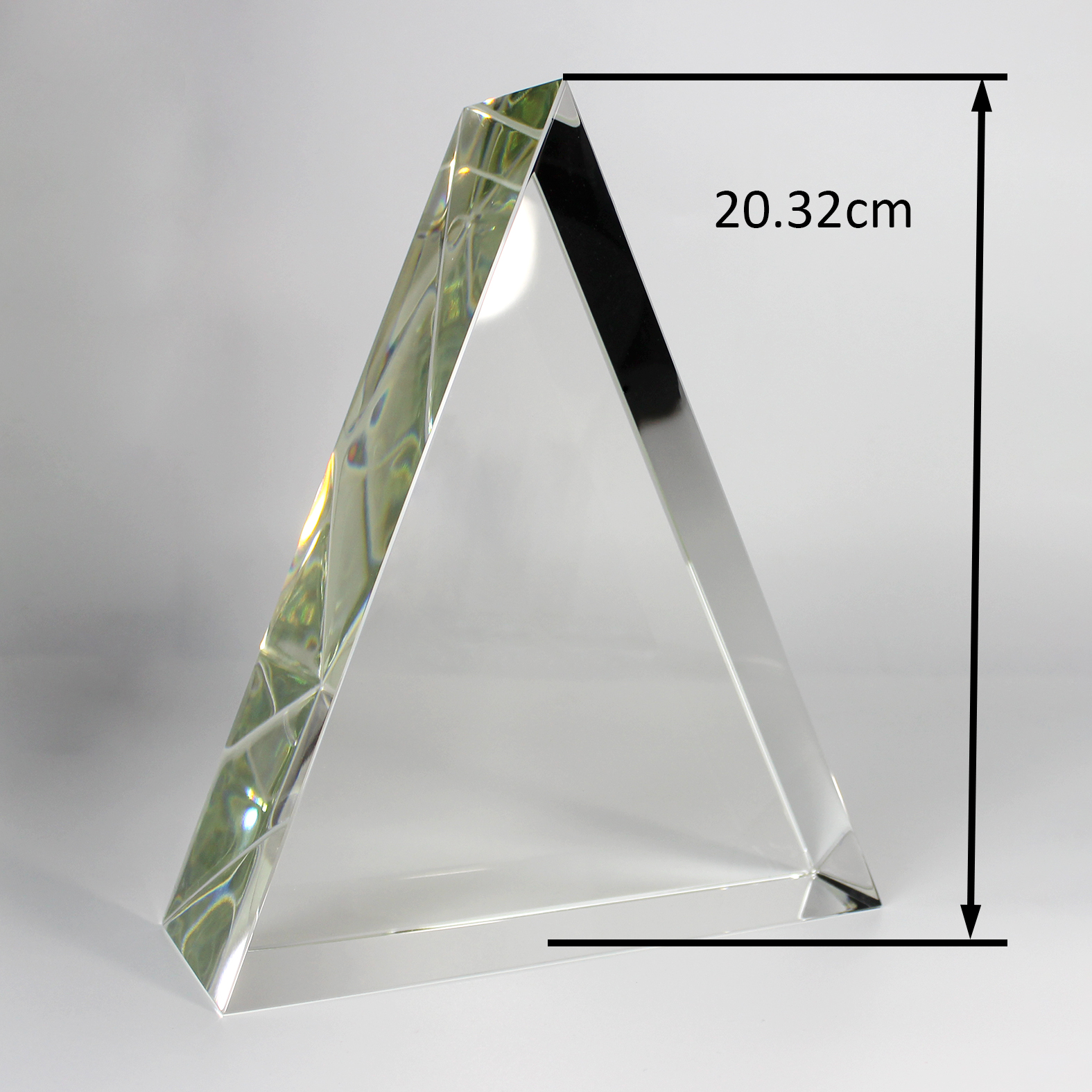 Triangular prism for precision optical applications