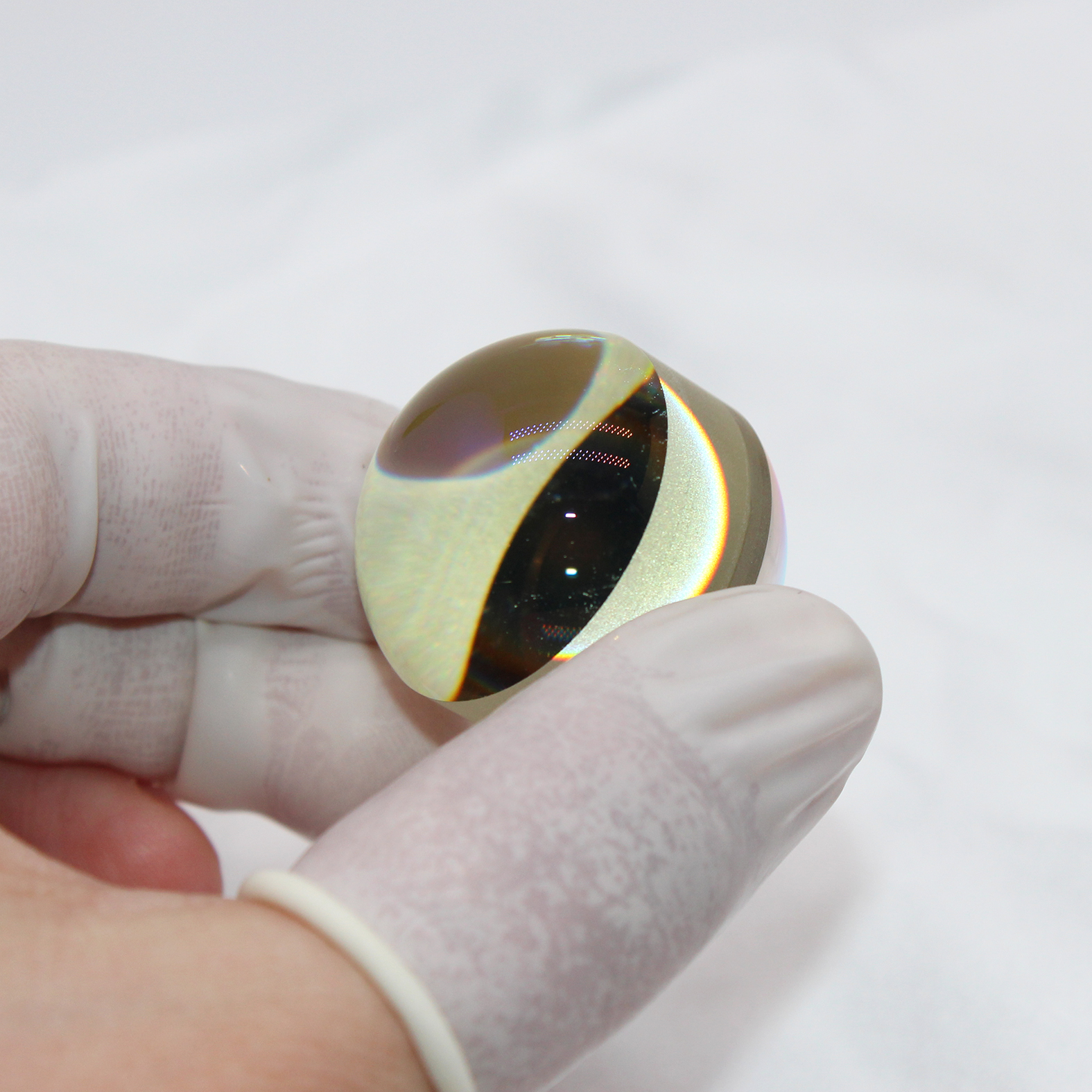Cat's eye reflector optical component