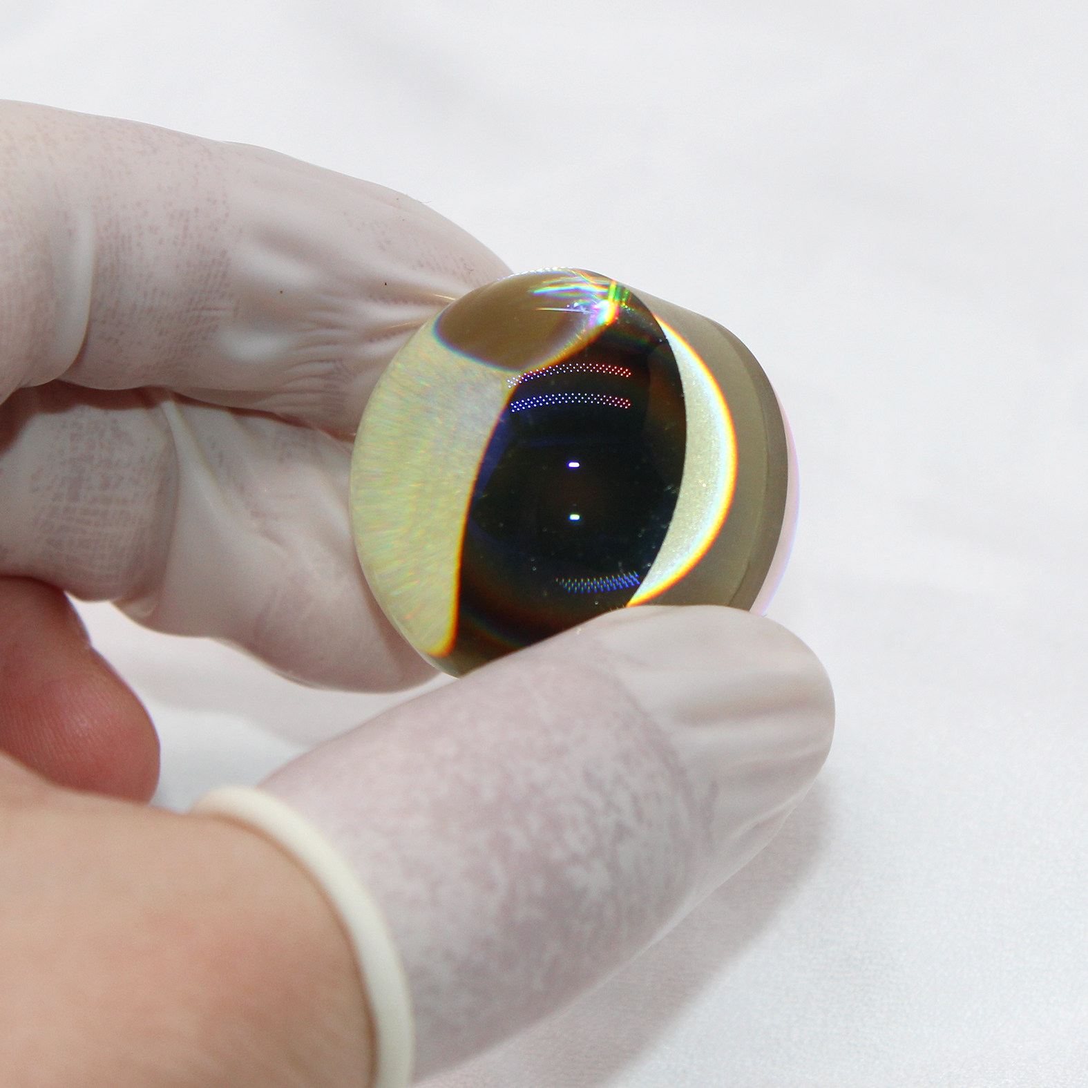 Cat's eye reflector optical component