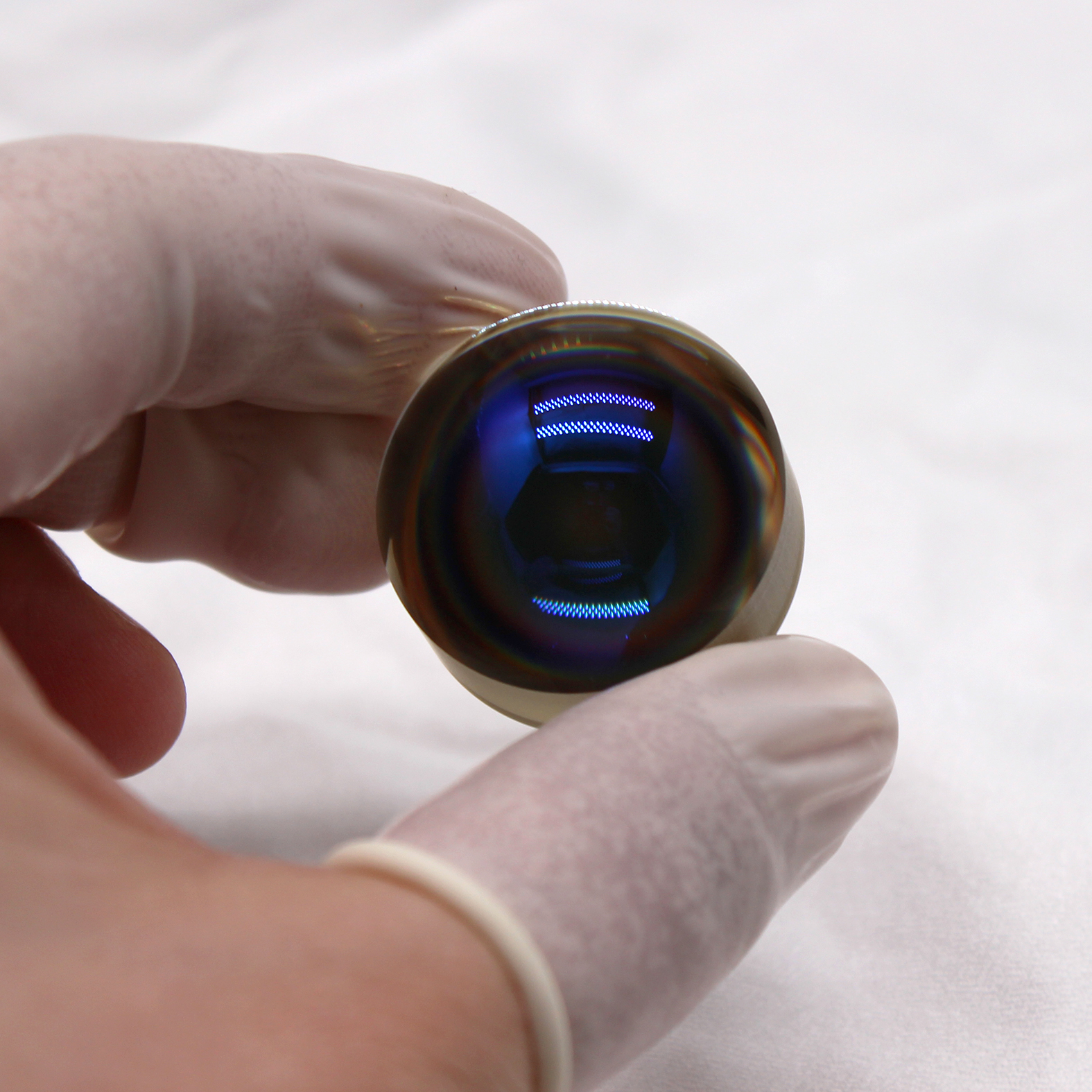 Cat's eye reflector optical component