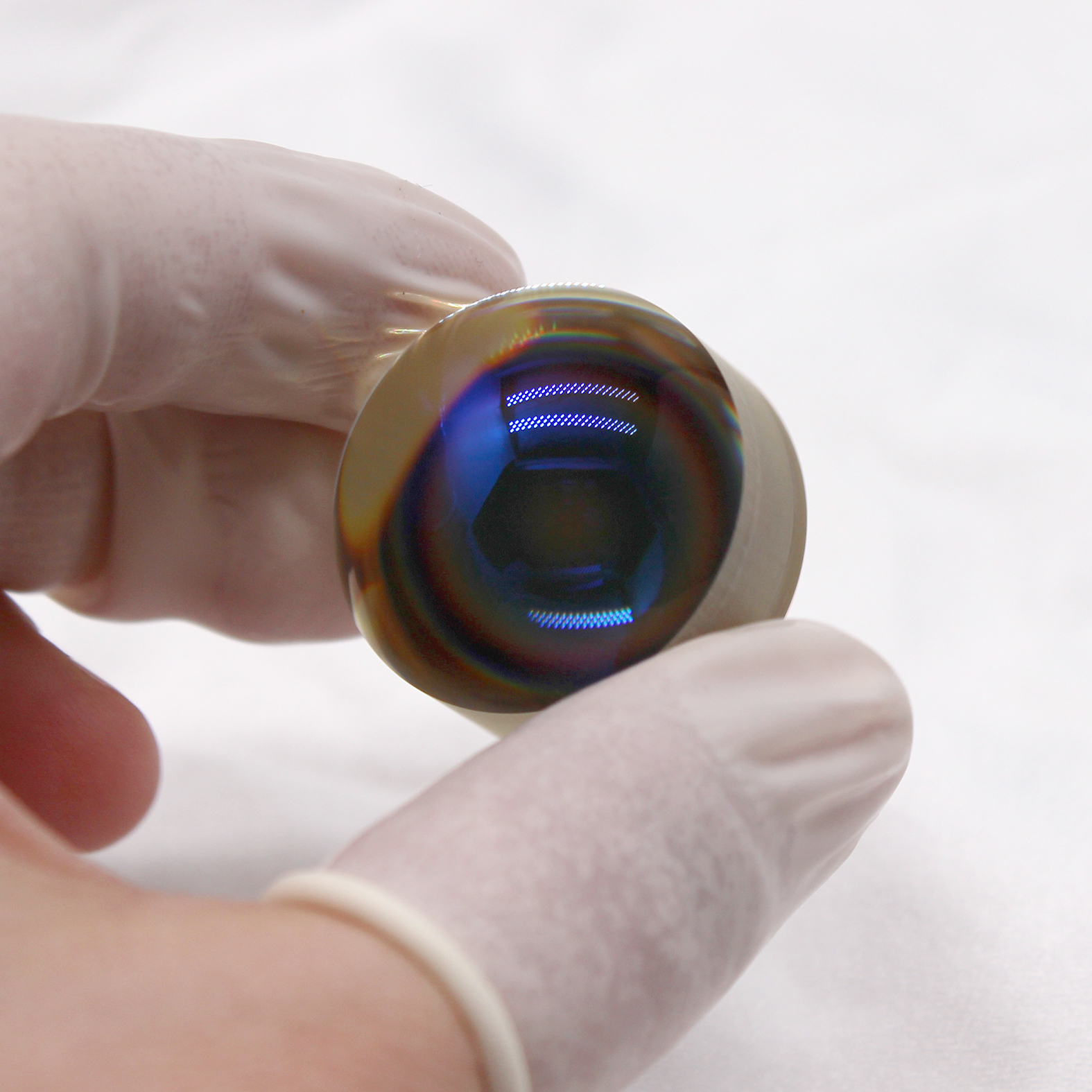 Cat's eye reflector optical component