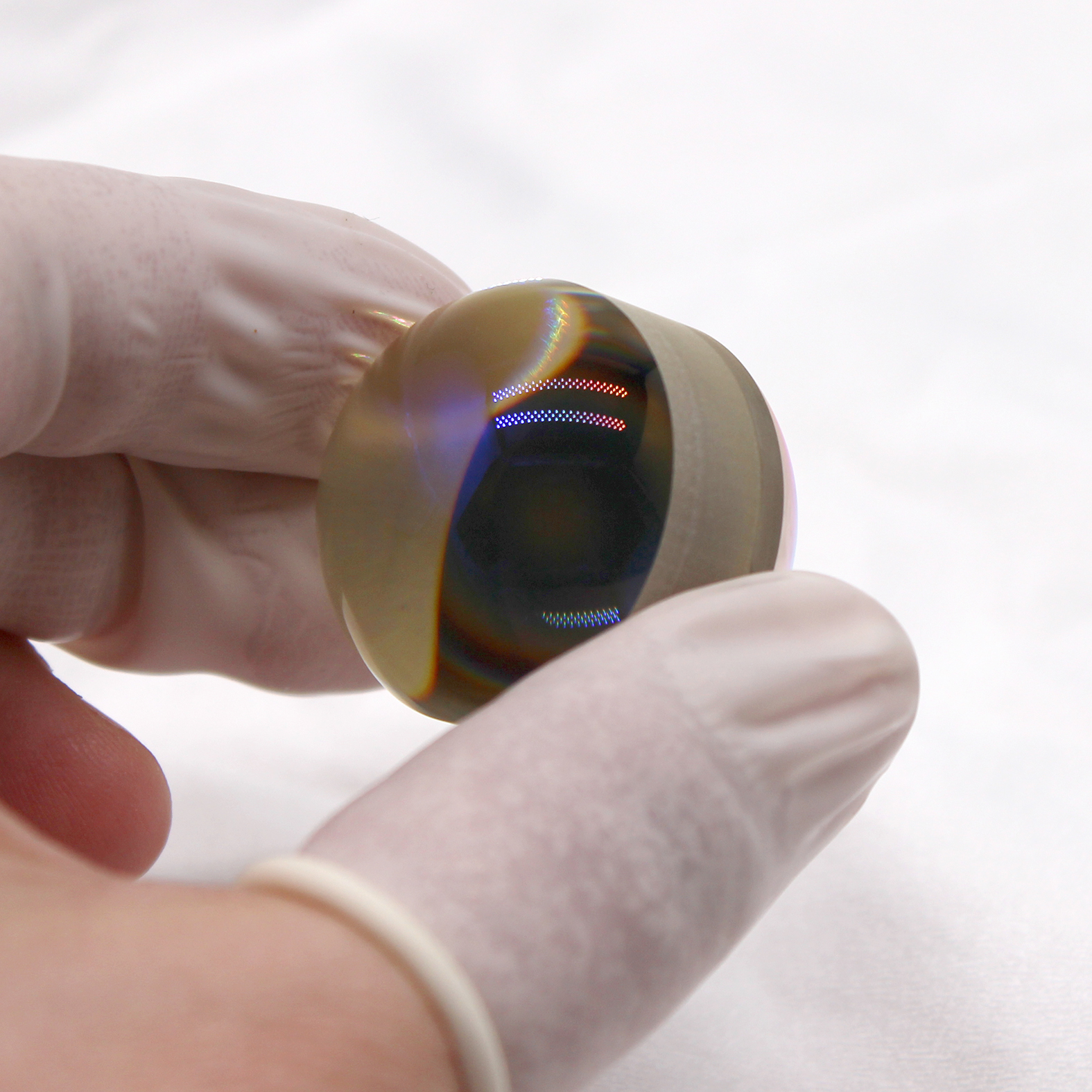 Cat's eye reflector optical component
