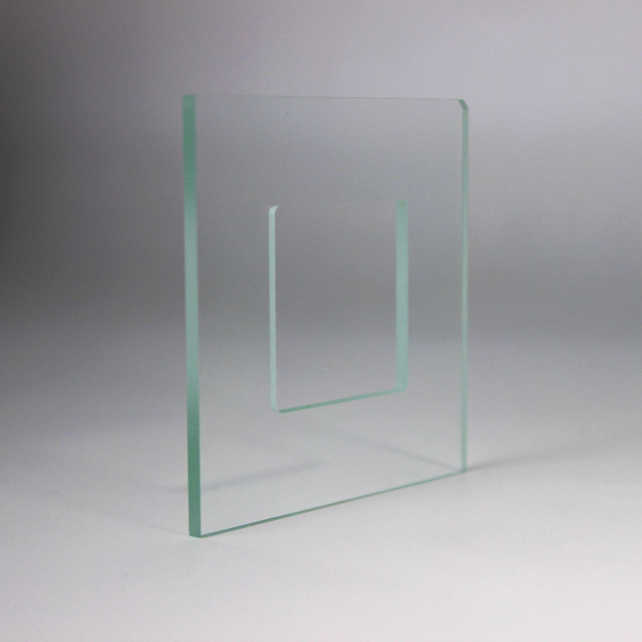 Optical window with hole for precision assembly