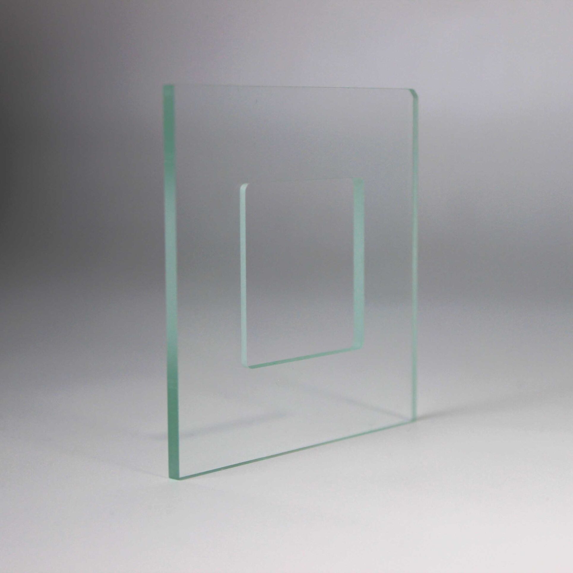 Optical window with hole for precision assembly