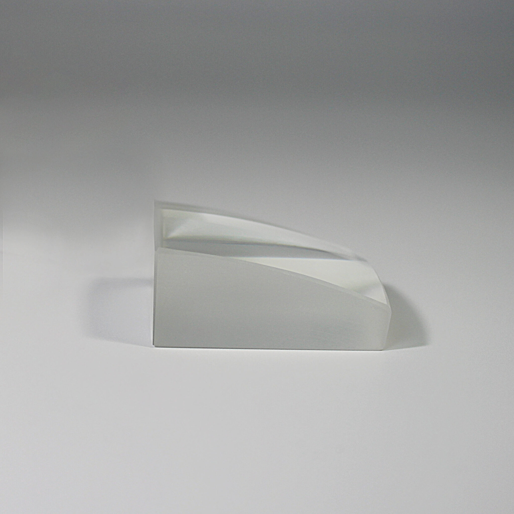 Precision cut spherical optical lens